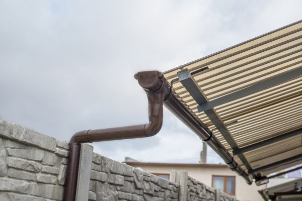 Plastic Downspout Installation in Granbury